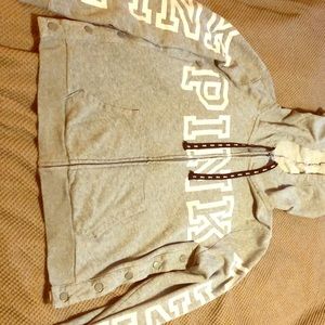 Pink brand hoodie with snaps on the side